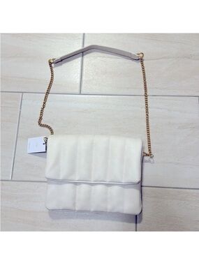 Fawn design the quilted crossbody clutch winter white matte chain strap